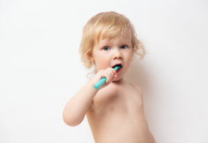 toddler brushing teeth